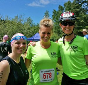 Our attorneys and paralegal supporting LAW Advocates as a team in the Lake Padden Triathlon